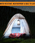 Rechargeable LED Camping Lantern With 360 Degree Illumination lighting up a tent in rainy night, IPX4 waterproof for camping