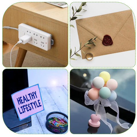 Power strip on wooden table, wax-sealed envelope, healthy lifestyle sign, and pastel balloon decor on reflective surface.