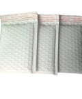3.5 By 5 Inch White Poly Bubble Mailers Padded Envelopes Self Sealing Shipping Bags Pack Of 50 showing bubble lining and seal