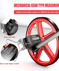 Close-up of a red distance measuring wheel showcasing mechanical gear type measurement and quick reset latch features.