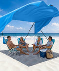 Beach Shade Canopy 100 Sq Ft Wind Powered Sunshade Sail For 4 To 6 People, setup on beach providing shade for group