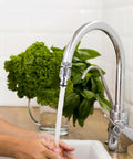 Sink to Hose Adapter Solid Brass 360 Degree Swivel Quick Connector attached to kitchen faucet with running water
