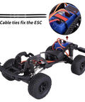 Beefy Carbon Fiber Chassis Kit For 1/18 TRX4M Bronco Defender Crawler with ECS securing straps, visible durable carbon frame.