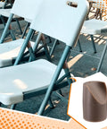 Twelve Pack Beige Folding Chair Leg Caps Seven Eighths Inch V Tip Stabilizer Feet Non Marring Floor Protectors for metal folding chairs.