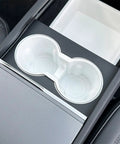 Slick Drop In Premium Soft Silicone Cup Holder Insert For Tesla Model 3 Highland 2024 And Up With Washable Shockproof Grip Easy Pop Out Secure Fit Center Console Set Up, showing a perfectly fitted insert in a Tesla cup holder.