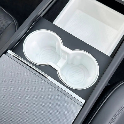 Slick Drop In Premium Soft Silicone Cup Holder Insert For Tesla Model 3 Highland 2024 And Up With Washable Shockproof Grip Easy Pop Out Secure Fit Center Console Set Up, showing a perfectly fitted insert in a Tesla cup holder.