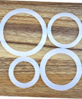 5 Pack Silicone Sealing Rings Replacement Gaskets For Coffee Pot Lids Espresso Pots And Canning Jars on wood surface