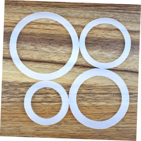 5 Pack Silicone Sealing Rings Replacement Gaskets For Coffee Pot Lids Espresso Pots And Canning Jars on wood surface