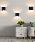 Dimmable 10W LED Indoor Wall Sconce In Black Finish, Up Down Wall Mount Light on living room wall, cozy warm white glow