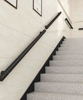 Slick Modern Indoor Stair Railing Kit Featuring Adjustable Stainless Steel Handrail And Wall Mount Banister With Two Inch Round Tube No Sweat Easy Install For Smooth Safe Steps Rock Solid Build visible on staircase.