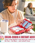 Family Friendly First Aid Kit With 200 Essentials For Kids, Travel Ready In A Compact Storage Bag on a camping table
