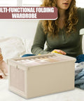 No Stress Foldable Storage Cubes With Heavy Duty Dual Handles For Thick Blankets Linens And Winter Jackets Fast To Flatten And Stack Away Every Single Day placed beside a mother and daughter on a bed.