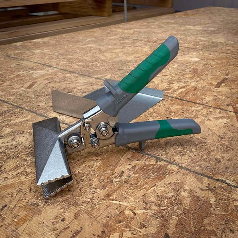 Sheet Metal Hand Seamer With 1/4 Inch Increment Marks, Heavy-Duty Steel Build, Comfortable Grip on a wood surface