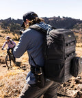 Person with ProTactic BP 450 AW III Camera Backpack With 4 Point Quick Access Versatile DSLR Mirrorless And Drone Gear in outdoor setting