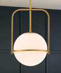 Slick Brass Pendant Light For Kitchen Island With Adjustable Height And Soft Frosted Glass Globe Ceiling Lamp For Dining Room Entryway Bedroom Modern Hanging Fixture Top Shelf Home Decor, close-up view.