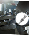 Heavy Duty Stainless Steel Indexing Lock Plunger Pin With Spring Loaded Safety Latch For A No Sweat Setup and Rock Solid Hold On Cabinets And Auto Parts, shown in a industrial setting.