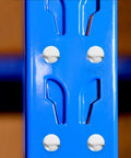 Galvanized Pallet Rack Safety Pins With J Bolts Pack Of 100 shown on blue heavy duty racking