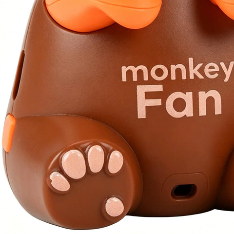 Rechargeable Usb Desktop Cooling Fan For Mugs And Bottles With Adjustable Speed Settings To Keep Coffee Tea Milk Water Frosty And Beat The Heat All Day Long, showing cute monkey design and paw details.