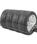 Heavy Duty Steel Wall Mounted Tire Rack Holds Thirty One To Fifty Six Inches holding four winter tires securely and neatly.