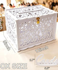 Slick White Silhouette Wedding Card Box With Lock And Slot, Dope Floral Hollow Envelope Holder angled view with dimensions on table.