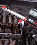 Pro Grade Half Inch Digital Torque Wrench With Angle And Preset Memory in use on car engine, showing digital display.