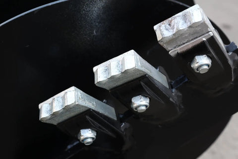Close-up of blades on Beefy Skid Steer Post Hole Auger Drive Attachment 12 Inch Diameter 46 Inch Drilling Depth Standard Flow Universal Quick Attach
