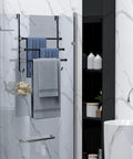 Black Wall Mounted Towel Rack Set With 3 Levels Per Unit And 2 Pieces, visible in a modern bathroom setup with towels