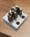 Disc Cutter Tool For Jewelry Making With 5 Sizes 12 mm To 25 mm Steel Forming Die, shown from top view on wooden surface.