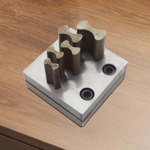 Disc Cutter Tool For Jewelry Making With 5 Sizes 12 mm To 25 mm Steel Forming Die, shown from top view on wooden surface.