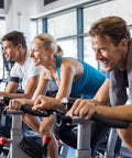 People using stationary bikes with 2 Pairs Adjustable Exercise Bike Pedal Straps For Stationary Bikes Universal Fit Rubber No Slip Foot Straps For Home Gym Durable Comfort And Secure Grip To Boost Your Workout Performance