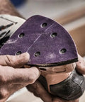 Person holding Top Shelf Heavy Duty Detail Sanding Sheets 80 Grit 5 Pack for detailed sanding tasks.