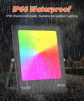 Led Floodlight RGB Ac220V 100W Flood Light Color Changing shown in rain, highlighting IP66 waterproof feature.