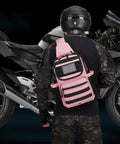 Person with Tactical Sling Crossbody Bag With Moveable Universal Holster 15L Capacity in pink by motorcycle