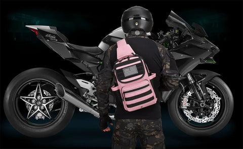 Person with Tactical Sling Crossbody Bag With Moveable Universal Holster 15L Capacity in pink by motorcycle