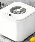 Slick Countertop Dishwasher Featuring Six Power Wash Jets And Instant Sanitizing Cycle For No Sweat Cleaning, Plug And Play Setup With Rapid Air Dry Tech Perfect For College Dorms Small Apartments And Travel Rvs close-up view of controls and spinning mechanism, modern white design.