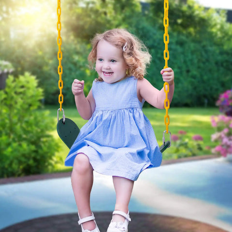 Child swinging on Heavy Duty Swing Seat With 66 Inch Chains For Outdoor Playground Use Includes Snap Hooks And Hanging Straps