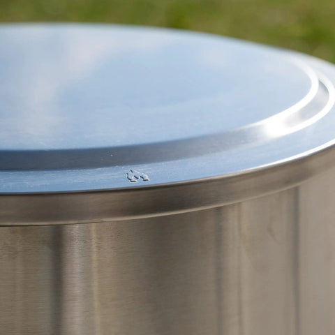Close-up of Yukon Lid Fire Pit Cover Premium 304 Stainless Steel Round Tabletop Accessory for Wood Burning and Camping
