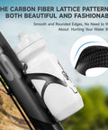 Upgrade Your Rig With This Ultralight Carbon Fiber Bike Water Bottle Cage Holder featuring a sleek carbon fiber pattern and smooth edges.