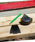Black Modular Wrench Organizer Rack 12-Piece Plastic Tool Storage Tray on wooden table with pencil and tape measure