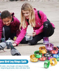 Children feeding pigeons with Split Aluminum Bird Leg Rings For Pigeons Parrots Doves And More, Open 1mm Foot Rings displayed.