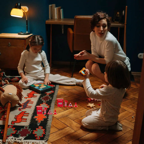 Children playing with Mini Firefighter Pretend Play Kit With Four Toy Fire Extinguishers And A Ladder for imaginative play.