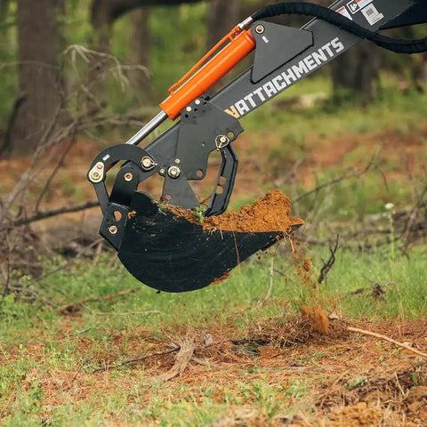 Mechanical Backhoe Thumb Attachment For Excavators Bolt On 5 Position Adjustable Thumb gripping soil in forested area