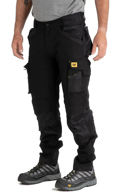Men's Advanced Trademark Stretch Pant Slim Fit Black 34W X 32L Durable Canvas Blend Belt Loops 15 Inch Leg Opening Built For Everyday Comfort Mobility Rugged Style, shown on model.