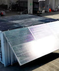 Heavy Duty Commercial Walk In Cold Storage Room Featuring Solar Cooling Panels, exterior view with solar panels folded out.