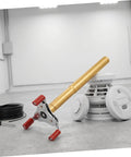 Dead Simple Fire Alarm Removal Tool With Long Extendable Pole positioned beside a ceiling smoke detector in a spacious room.