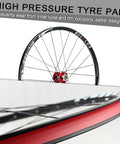 All Terrain Mountain Bike Wheelset With Carbon Hub For 26 27.5 And 29 Inches, showing high pressure tyre pad and red rim detail