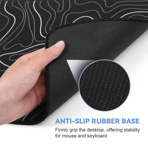 Close-up of anti-slip rubber base of Beastly Ultra Wide Gaming Mouse Pad XL 31.5 By 11.8 Inches With Black Topographic Design.