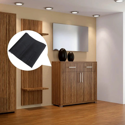 Black Peel And Stick Wallpaper Roll Waterproof Vinyl Wrap For Kitchen Cabinets shown on a wood cabinet backdrop.