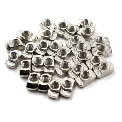 100 Pcs Rugged Beefy 4545 Series M6 T Slot Hammer Head Fastener T Nuts Nickel Plated Carbon Steel laid out on white background.