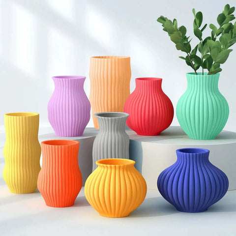 Colorful 3D printed vases using PETG Filament 1.75mm Ultra Tough Heat Optimized Odorless Black 4Kg 4 Pack, various shapes and sizes